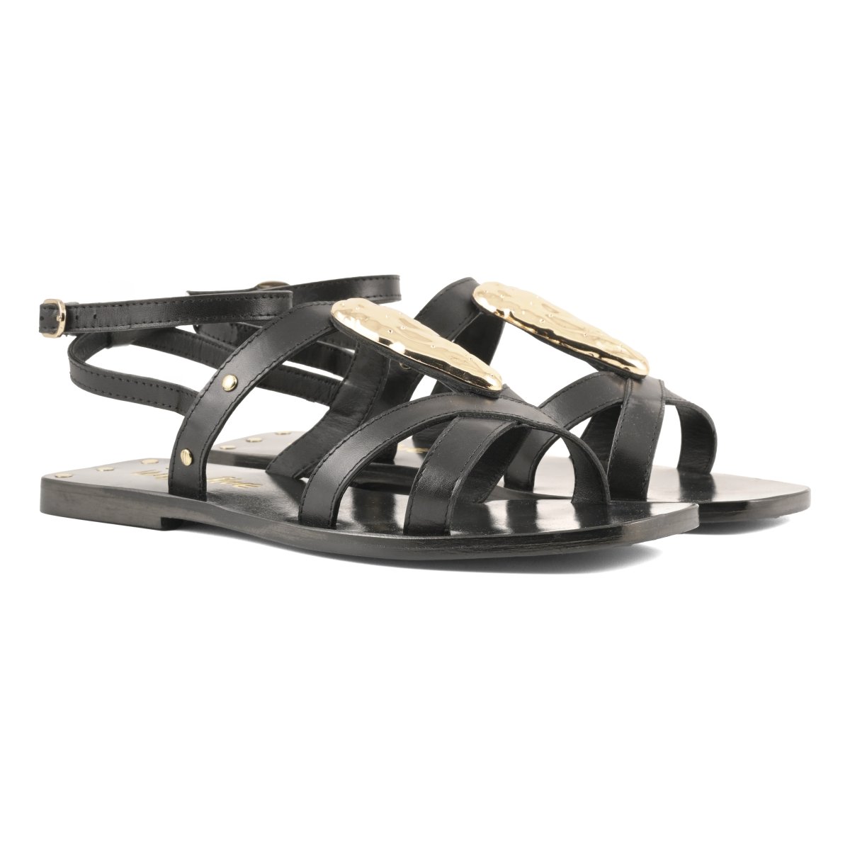 Sandalo in pelle con accessorio in metallo